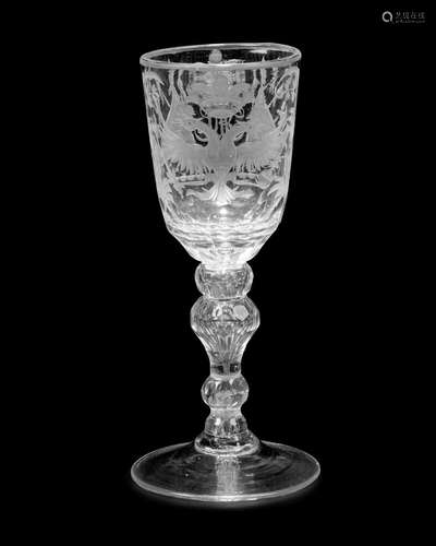 A RUSSIAN STYLE ENGRAVED FROSTED AND CLEAR GLASS GOBLETIn th...