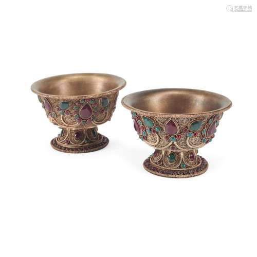 A PAIR OF FILIGREE AND SEMI-PRECIOUS STONE MOUNTED COPPER FO...