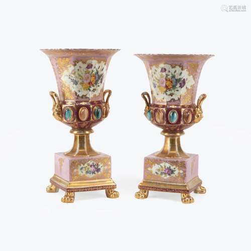 A PAIR OF SÈVRES STYLE PORCELAIN CAMPAGNA FORM VASES ON STAN...