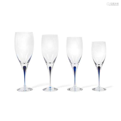 AN ORREFORS GLASS STEMWARE SERVICE IN THE INTERMEZZO BLUE PA...