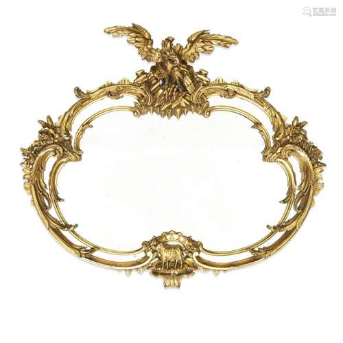 A GEORGE III STYLE CARVED GILTWOOD OVAL MIRROR