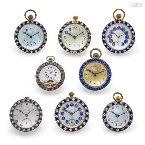 A GROUP OF EIGHT BALL CLOCKS