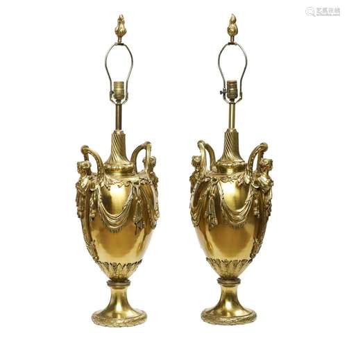 A PAIR OF LOUIS XVI STYLE GILT METAL TWO-HANDLED URNS