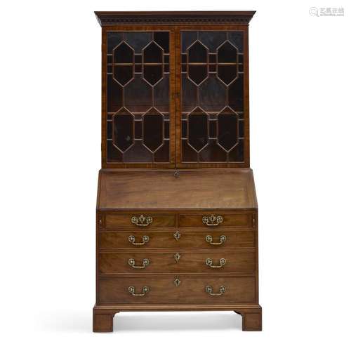 A GEORGE III MAHOGANY BUREAU BOOKCASEIn the manner of Wright...