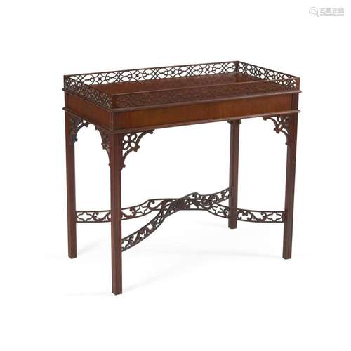 A GEORGE III STYLE MAHOGANY TEA TABLE