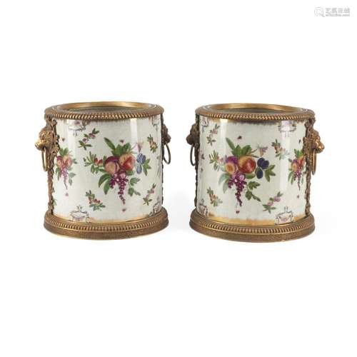 A PAIR OF FRENCH STYLE GILT BRONZE MOUNTED PORCELAIN JARDINI...