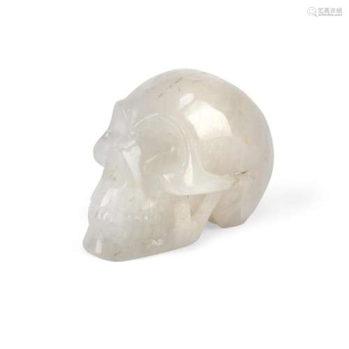 A CARVED ROCK CRYSTAL SKULL