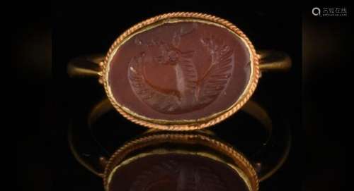 Sasanian Gold Sasanian carnelian Intaglio with winged stag i...