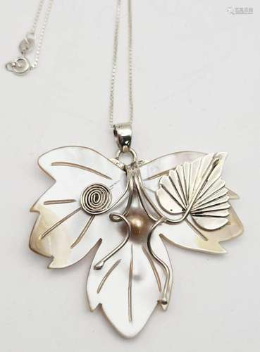 CARVED SHELL FLOWER PENDANT WITH STERLING