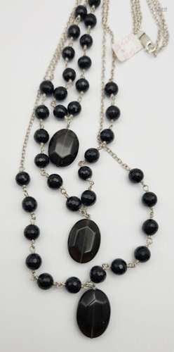 STERLING NECKLACE LOADED WITH BLACK BEAD