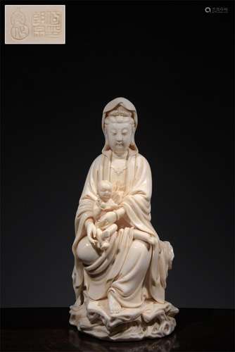 A Chinese White Glazed Porcelain Figure of Buddha