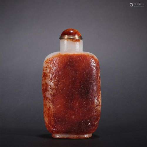 A Chinese Carved Jade Snuff Bottle