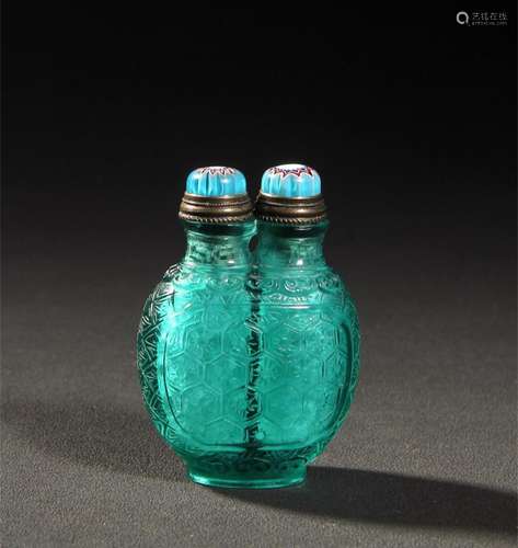 A Chinese Carved Peking Glass Snuff Bottle