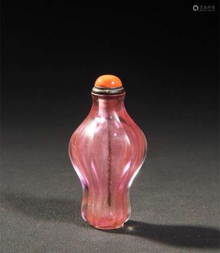 A Chinese Carved Peking Glass Snuff Bottle