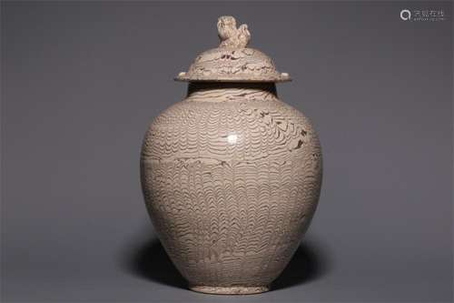 A Chinese White Glazed Porcelain Jar with Lid