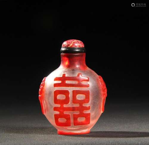 A Chinese Carved Peking Glass Snuff Bottle