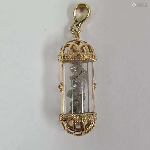 14k Gold Pendant Filled with Possible Raw Diamonds