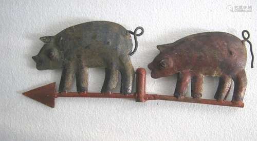 Iron twin pigs weather vane