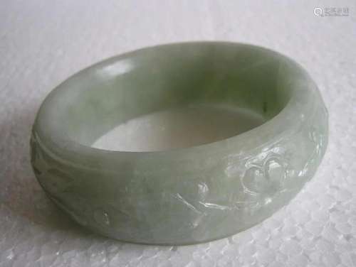 Chinese Jade bangle , flower & leaves carved .