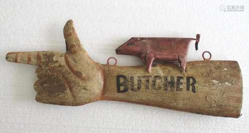 Butcher hand direction trade , store display advertisement s...