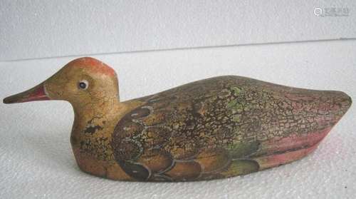 Wooden shore decoy duck