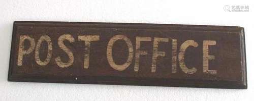 Wooden name plate " Post office " .