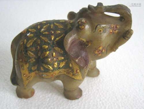 Marble elephant with gold decoration