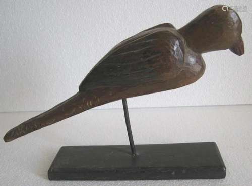 Wooden parrot on stand