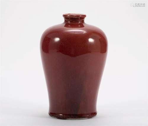 Red glazed plum vase in the Qing Dynasty