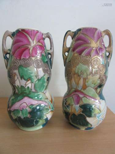 Pair antique Japanese floral pottery double handle vases 12....