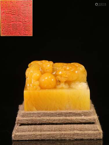 . Shou field-yellow stone hand-carved benevolent button seal...