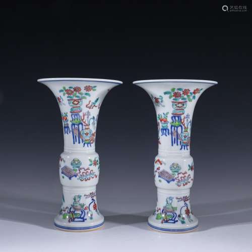 The middle bucket color figure flower vase with a pair of an...