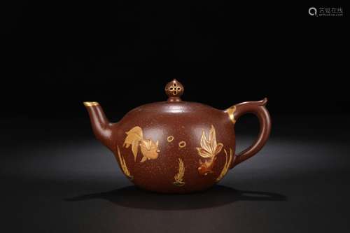 Figure the teapot, yixing purple sand heap of carving a gold...