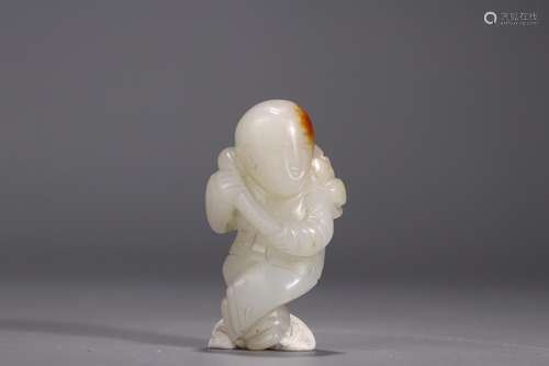 A: hetian jade lotus lad3 cm long and 2 cm wide, 5.5 cm high...