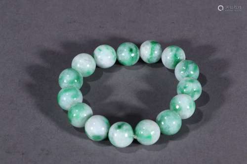 : jade d stringSize: bead diameter 1.4 cm weighs 71 g.Introd...