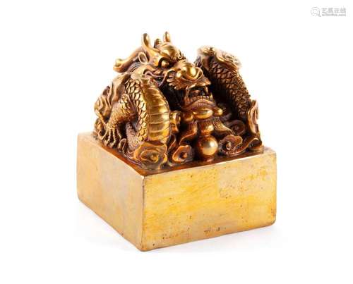 A CHINESE GILT BRONZE DRAGON SEAL