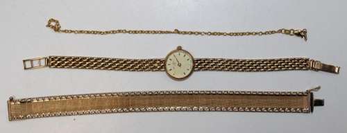 A ladys 9ct gold Rotary wristwatch with a 2.5cm champagne ba...