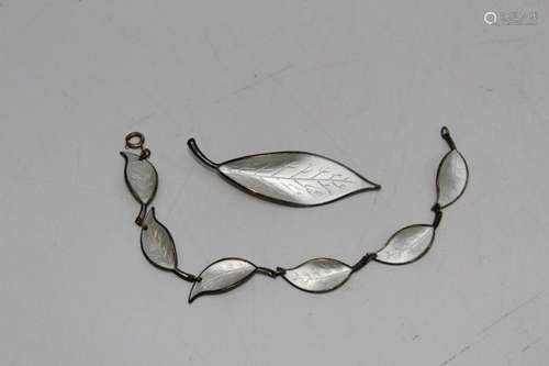 A David Anderson white enamel and silver leaf brooch and bra...