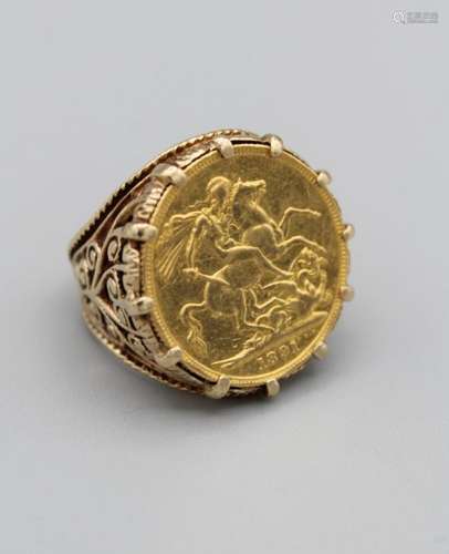 An 1891 Victoria sovereign ring in a yellow metal mount stam...