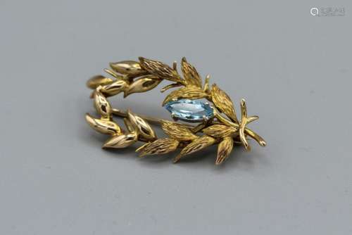 An aquamarine set laurel spray brooch in 9ct gold hallmarked...