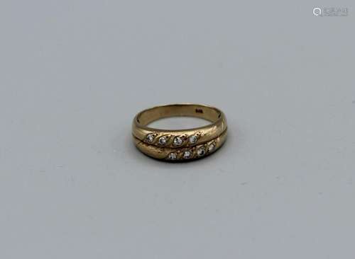 A diamond set double band ring in yellow metal stamped 375, ...