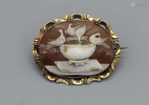 A shell cameo brooch, featuring doves in a bird bath, in unm...