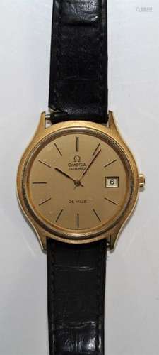 A gentlemans Omega De Ville Quartz with gold dial, baton num...