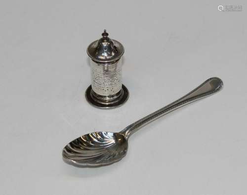 A sterling silver pepper pot and a silver fruit spoon, gross...