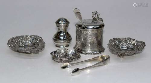 A selection of sterling silver tableware comprising a pepper...