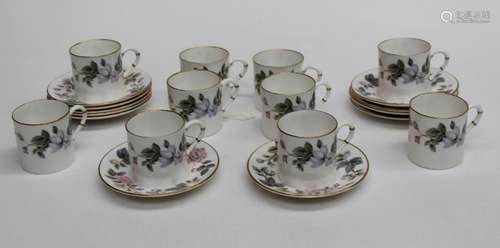 A set of ten Royal Worcester June Garland coffee cans and sa...