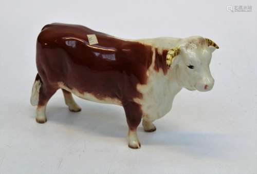 A Beswick figure 1422 of a Jersey Bull  Dunsley coy boy H12c...