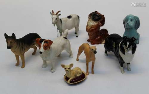 A group of seven Beswick figures comprising an Alsatian, mat...