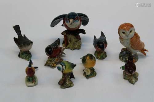 A group of nine Beswick figures of birds comprising a Kingfi...