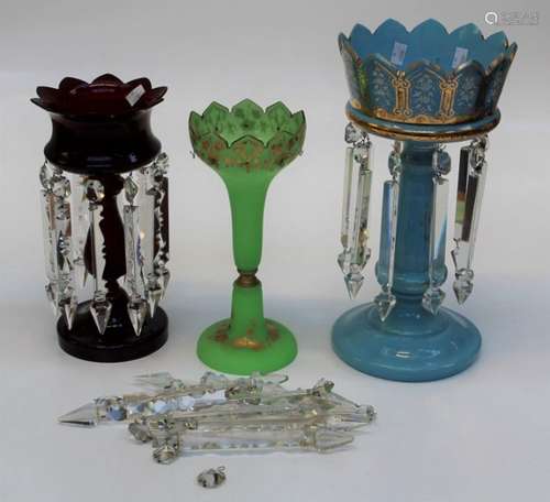 An Edwardian ruby glass table lustre with icicle pendant dro...